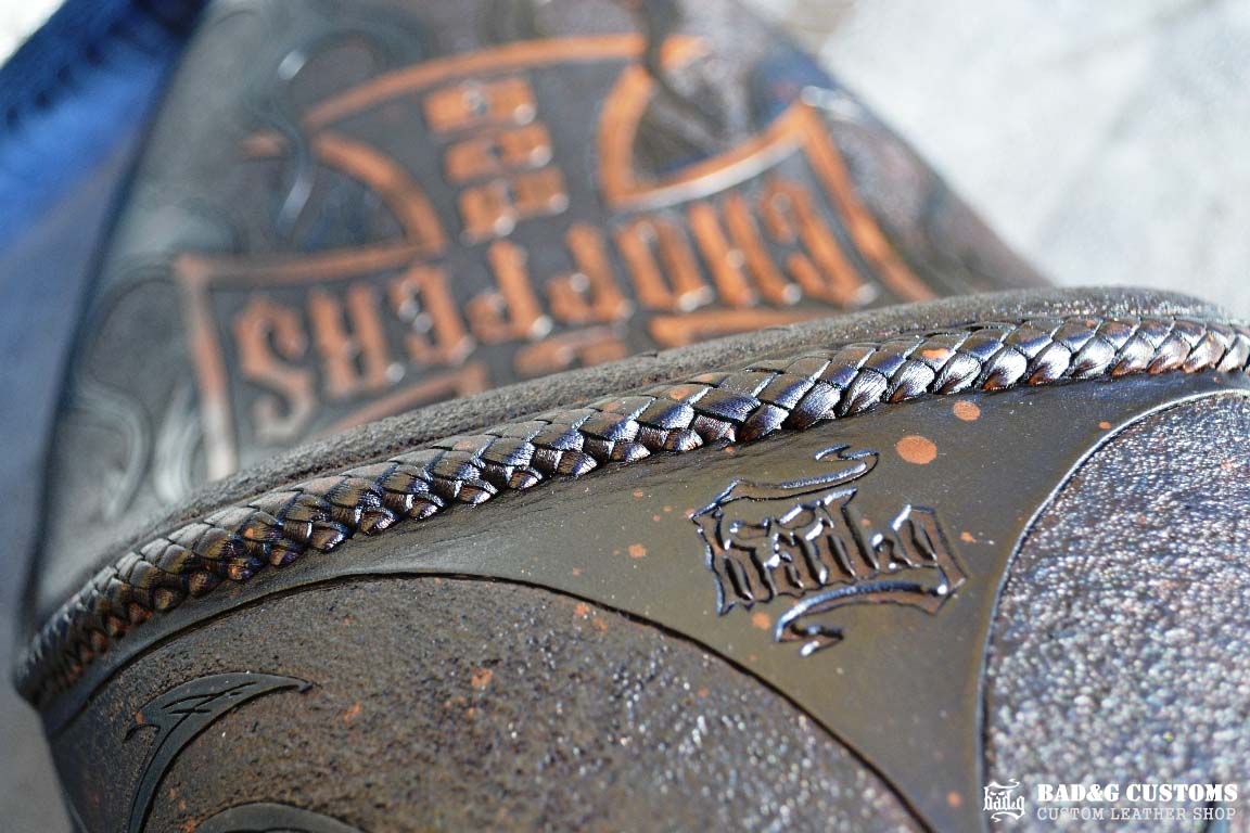 "Big Dog Choppers" logo design hand tooled and braided. Antiqued Blue Veg tan leather with kangaroo lace. West Coast Choppers for Life!