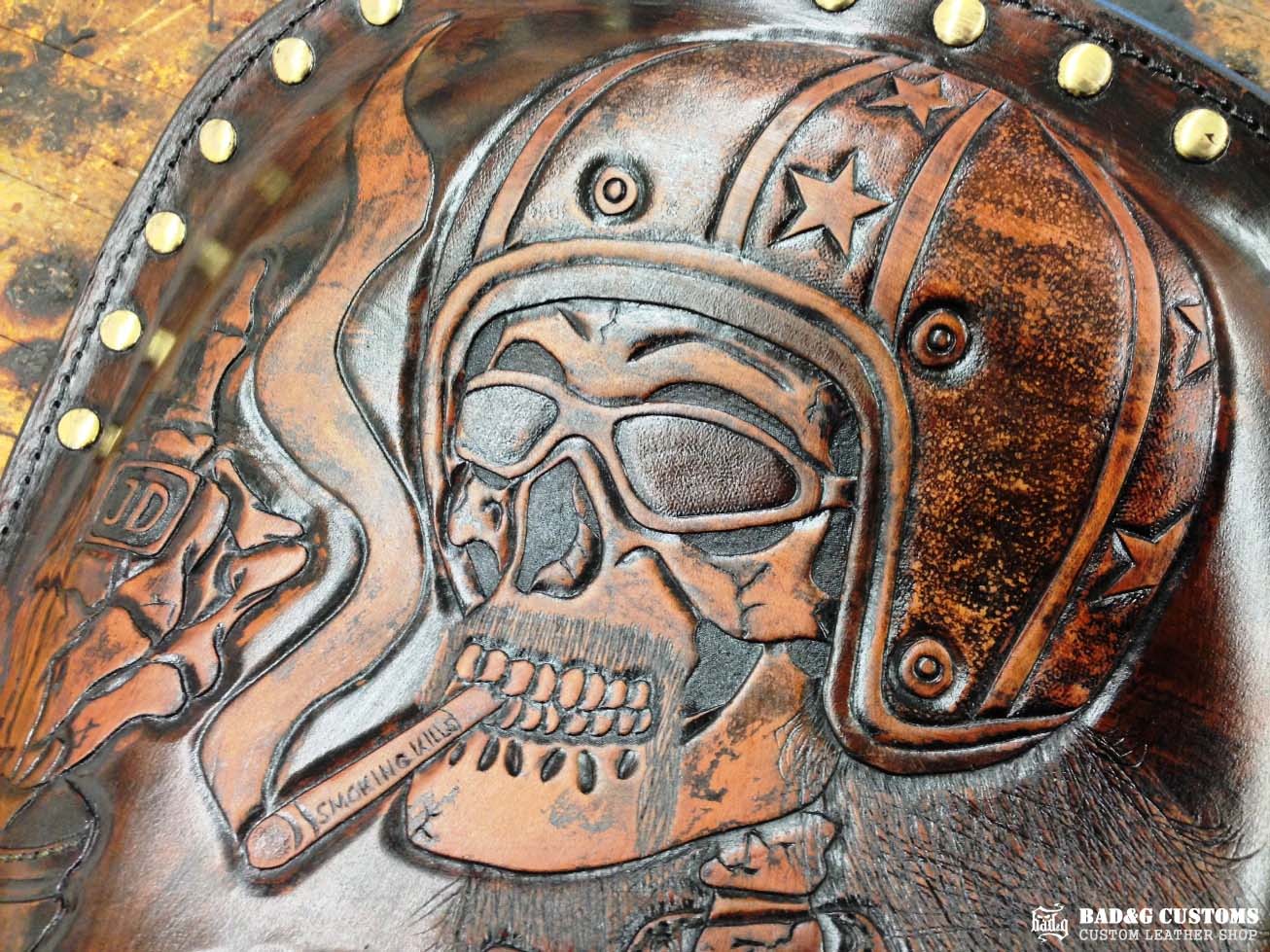 We’re proud to showcase a custom-made seat and saddlebags set crafted specifically for Doug Wothke, the legendary round-the-world motorcycle traveler. Made from hand-tooled and antiqued veg-tan leather, this set took countless hours of expert craftsmanship to complete. Designed for both durability and vintage authenticity, it will accompany him on the 2014 Cannonball Motorcycle Race, as he tackles this grueling challenge aboard his classic Harley-Davidson JD motorcycle. A true tribute to adventure!